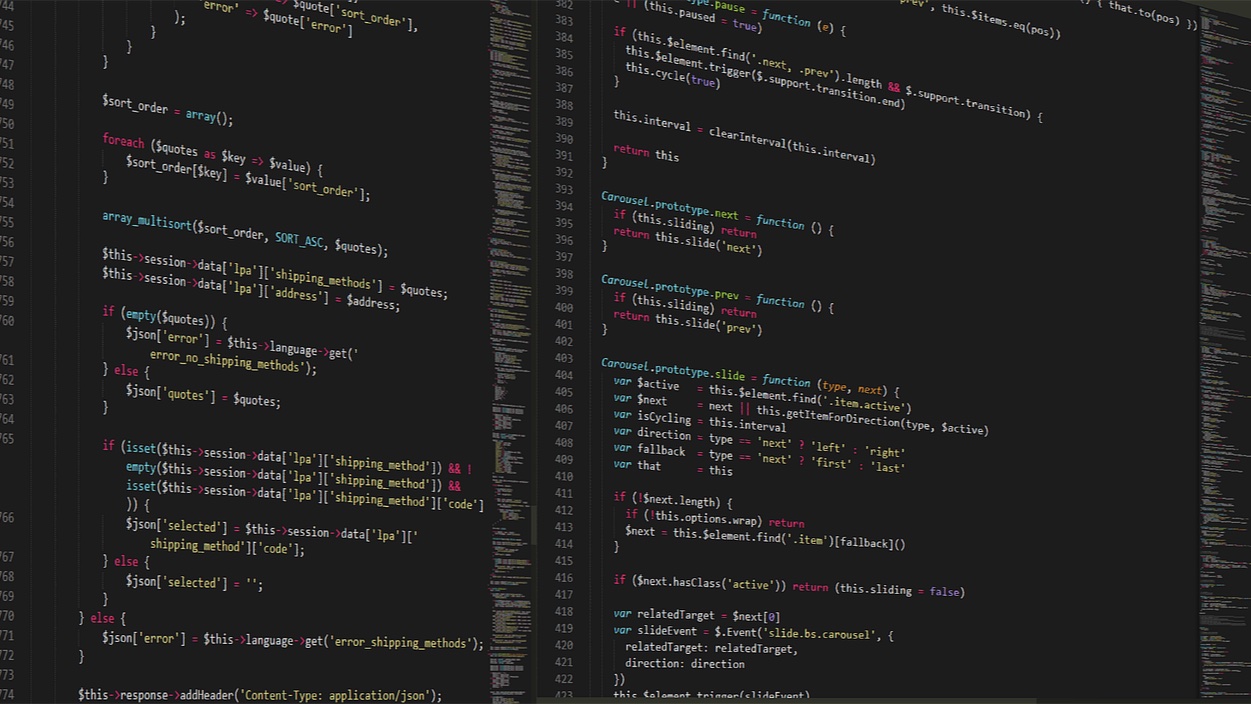 Pantalla con código PHP y JavaScript en un editor de fondo oscuro